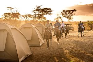 Riders ease into fly camp at golden hour