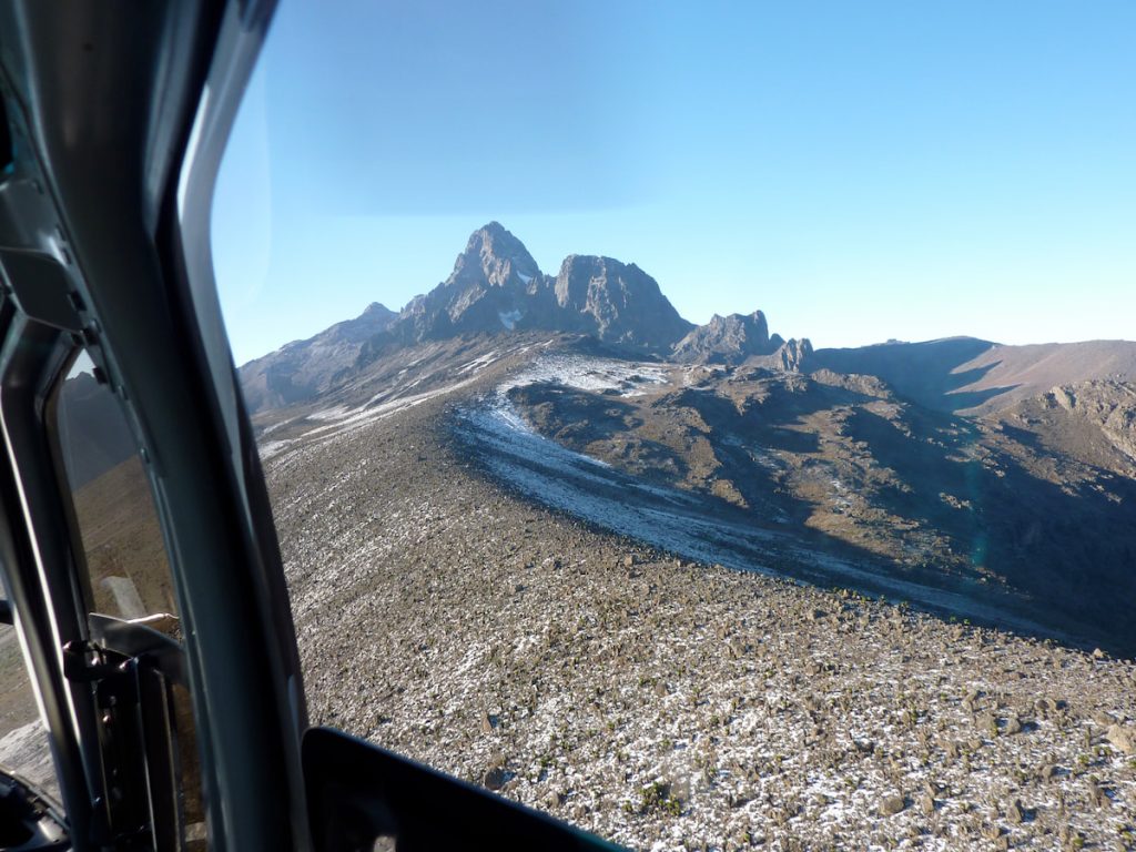 Aerial view of Mount Kenya above Lewa Wildlife Conservancy landscape from a helicopter, northern Kenya